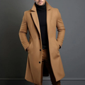 Men's khaki wool overcoat worn open, notched lapels, button front, long sleeves