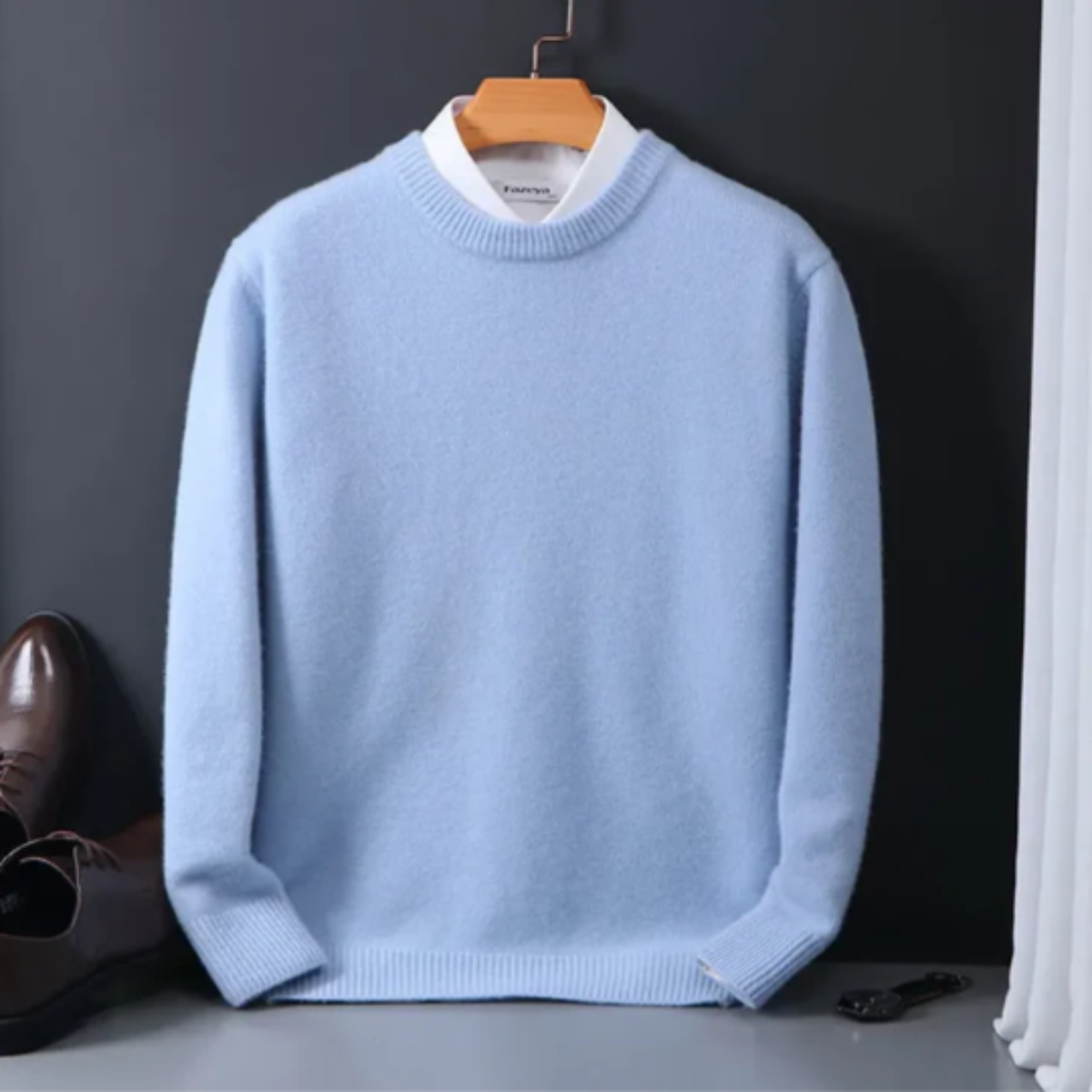 Men’s cashmere crew neck sweater on hanger, long sleeves, light blue knit