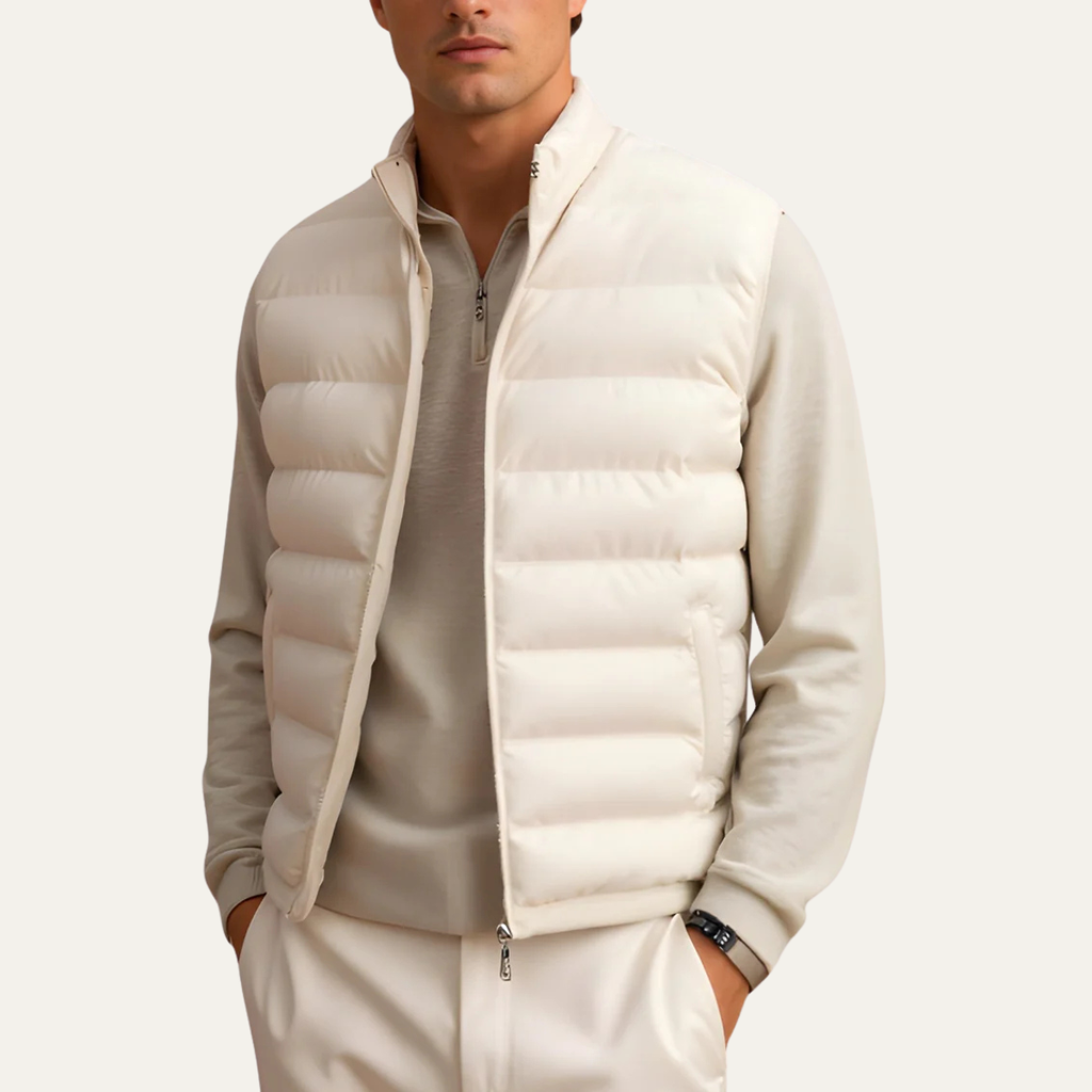 Lightweight down puffer vest in beige with stand collar, full zip, and quilted baffles