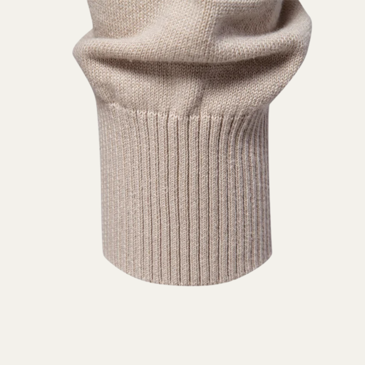 Beige knit sweater ribbed bottom hem with vertical knit ribbing