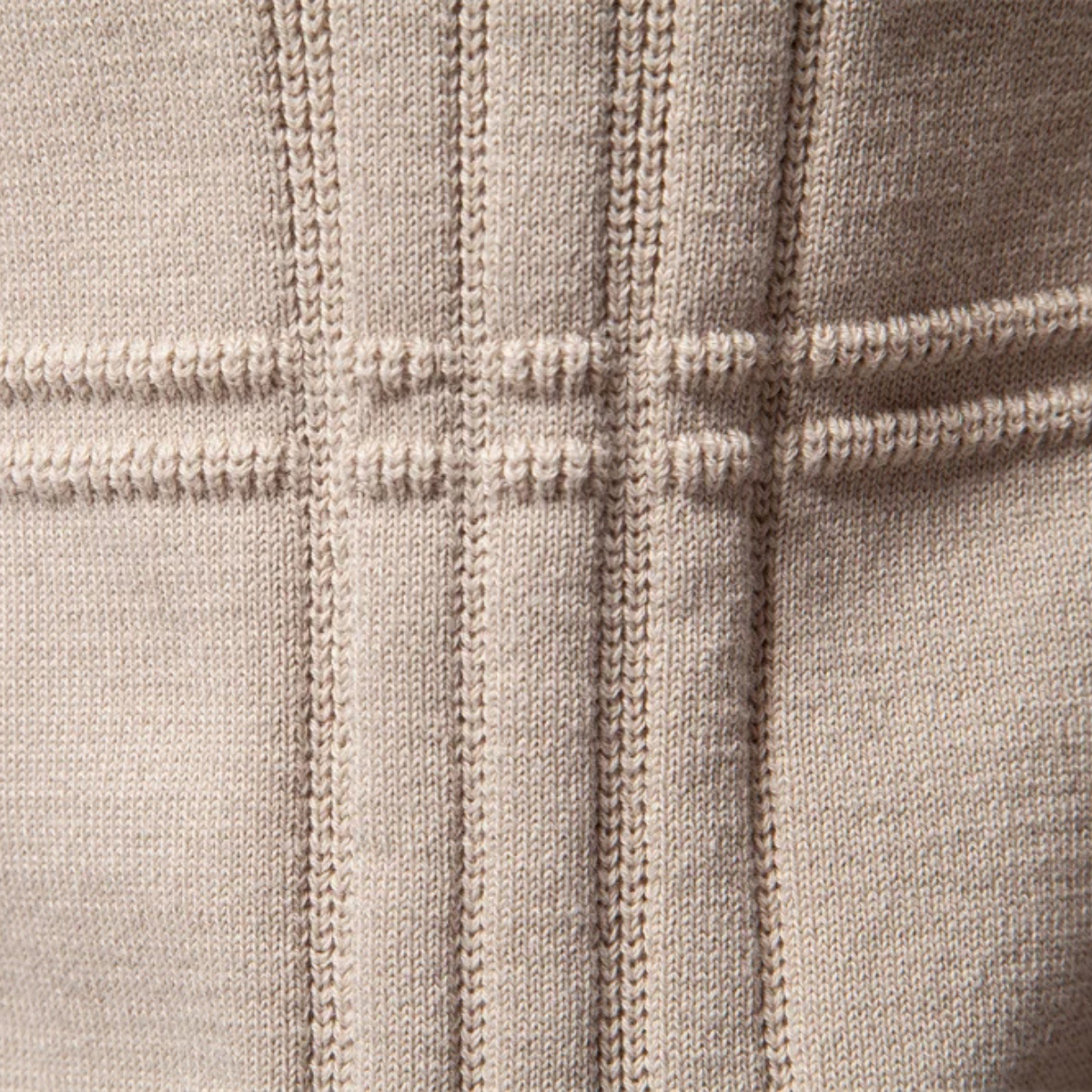 Beige knit sweater panel with vertical and horizontal stitched stripe details
