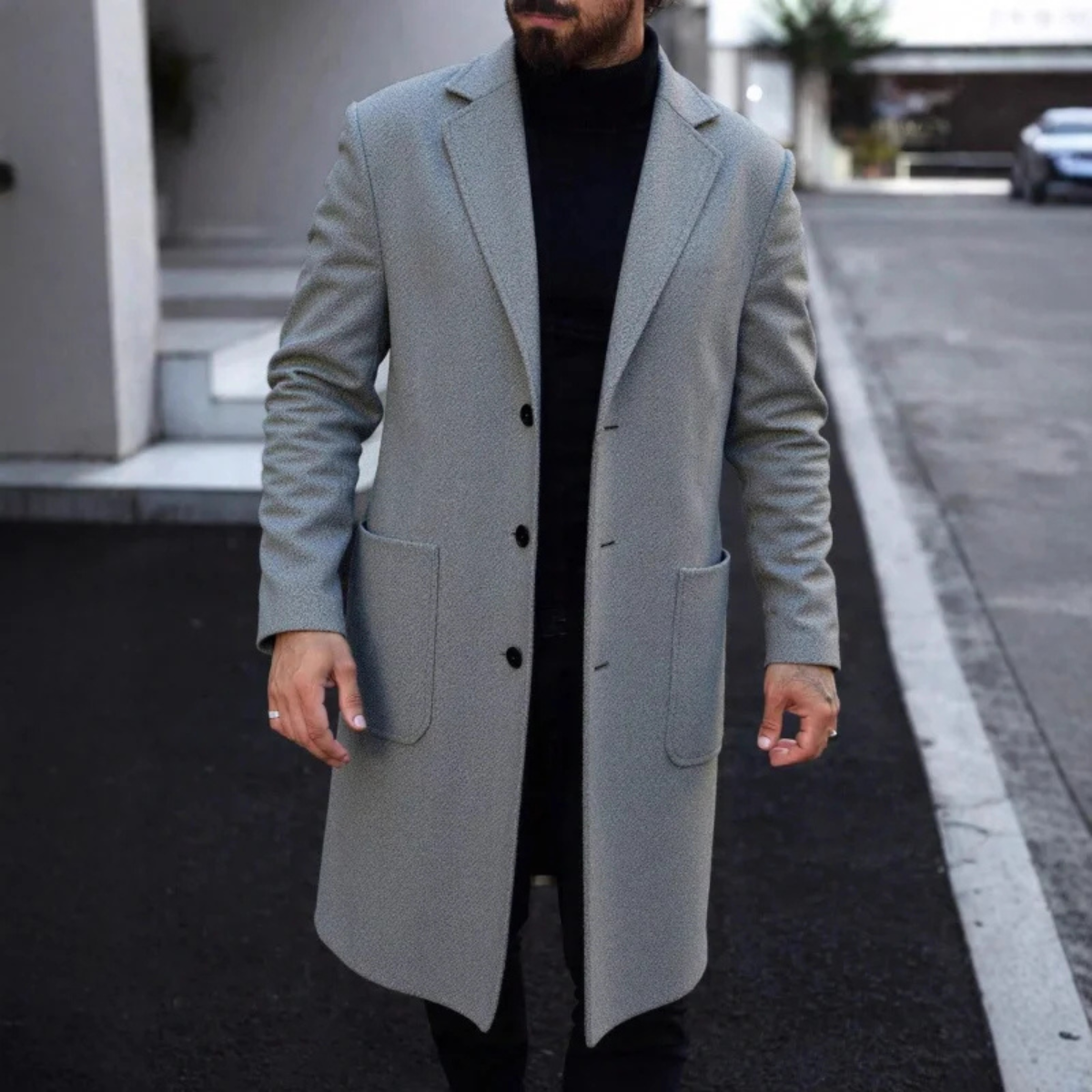 Men’s light gray slim-fit overcoat with notched lapels, button front, and flap pockets