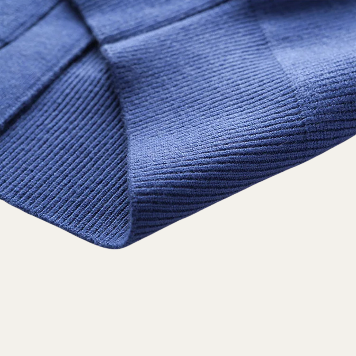 Blue knit sweater vest hem, ribbed trim at V-neck