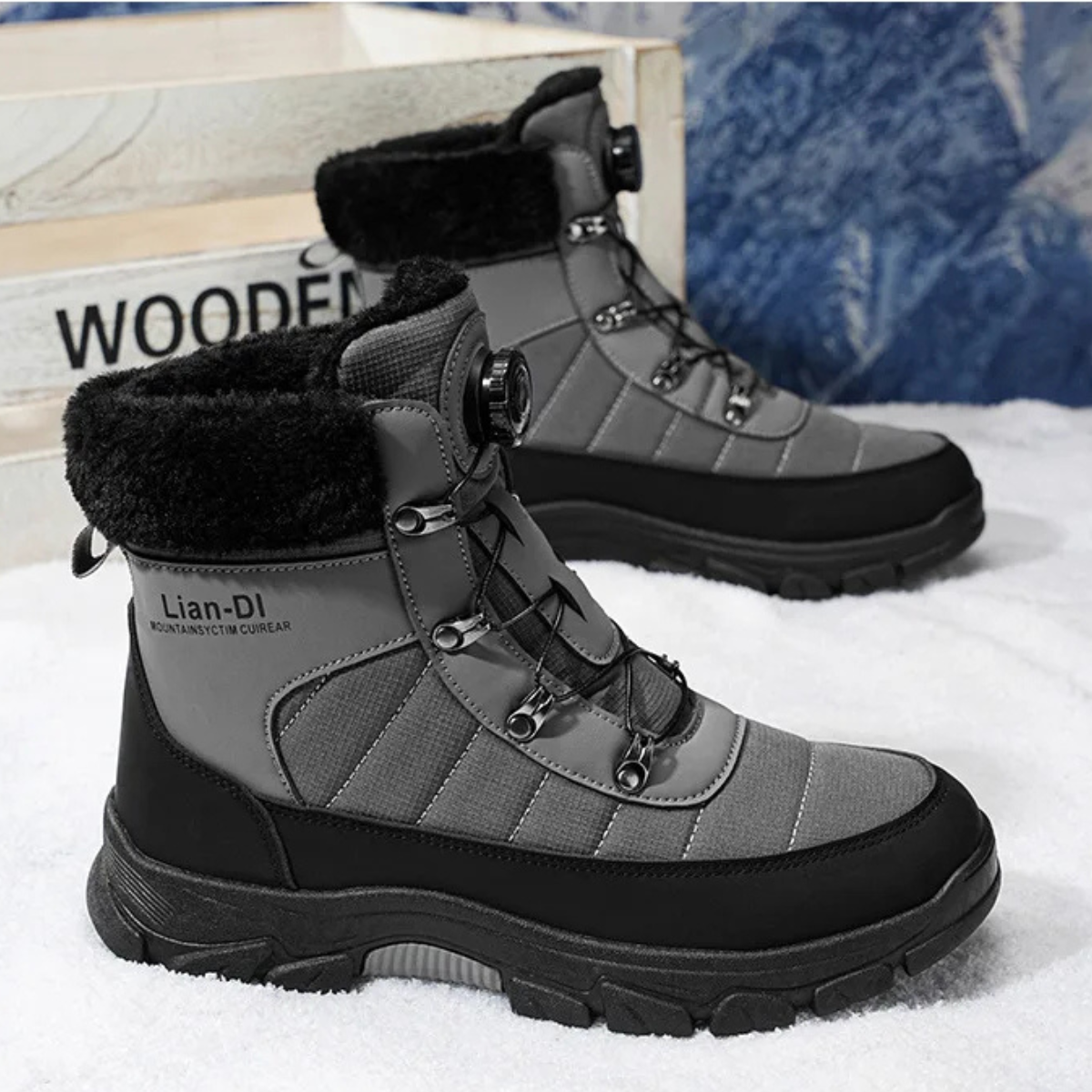 Men's gray and black lace-up snow boots with faux fur cuffs and chunky traction outsole