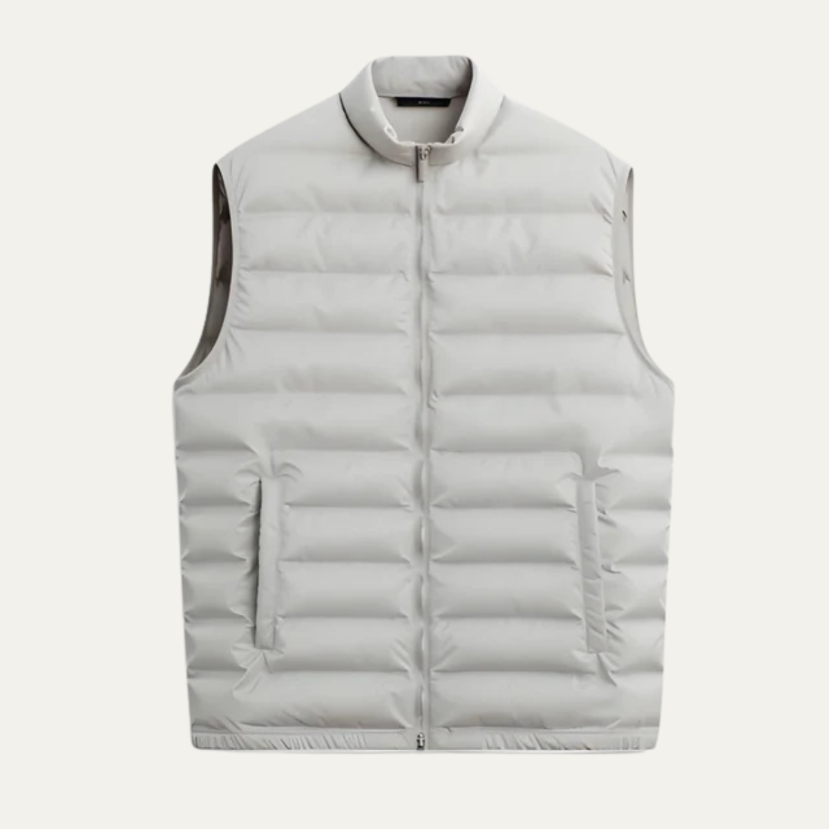 Light gray lightweight down puffer vest with full-zip front and stand collar