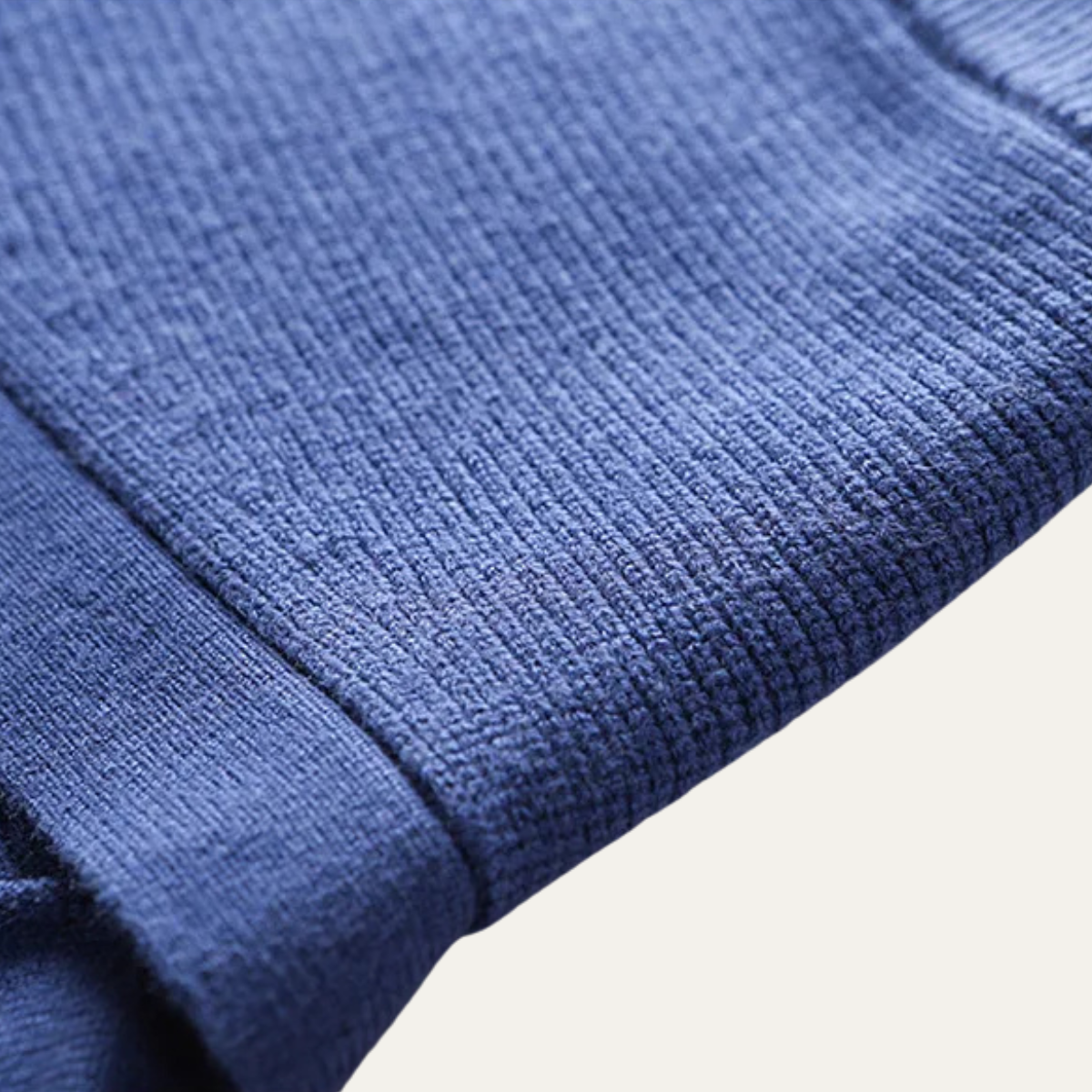 Blue knit sweater vest ribbed cuff and textured knit detail