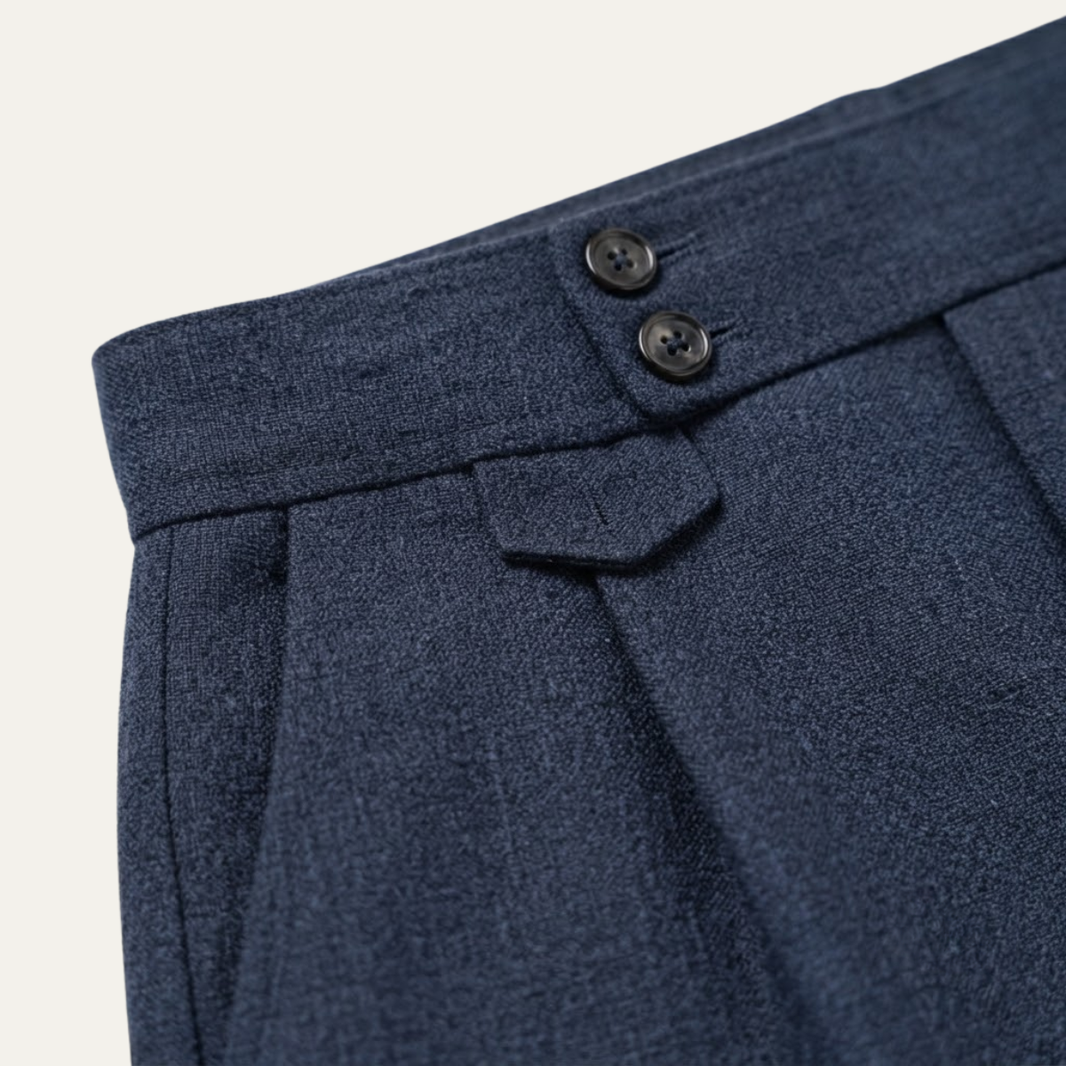 Men's high-waisted pleated dress pants in dark blue, button waistband and front pleats