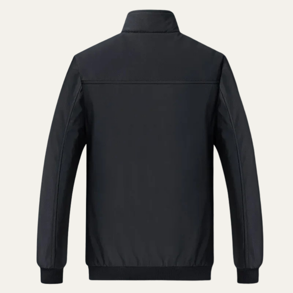 Dark blue men’s jacket back view with stand collar, ribbed cuffs, and smooth outer shell.
