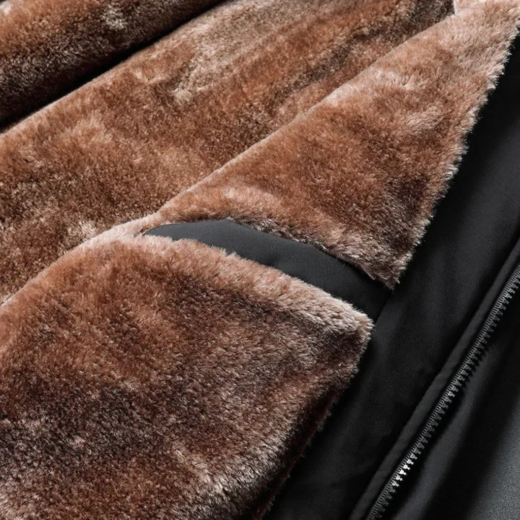 Fleece-lined interior in brown tones with visible jacket seam and zipper edge.