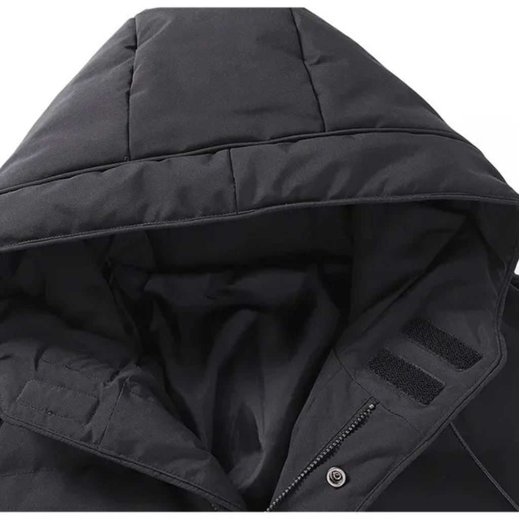 Black hooded puffer jacket close-up with lined collar and fabric texture