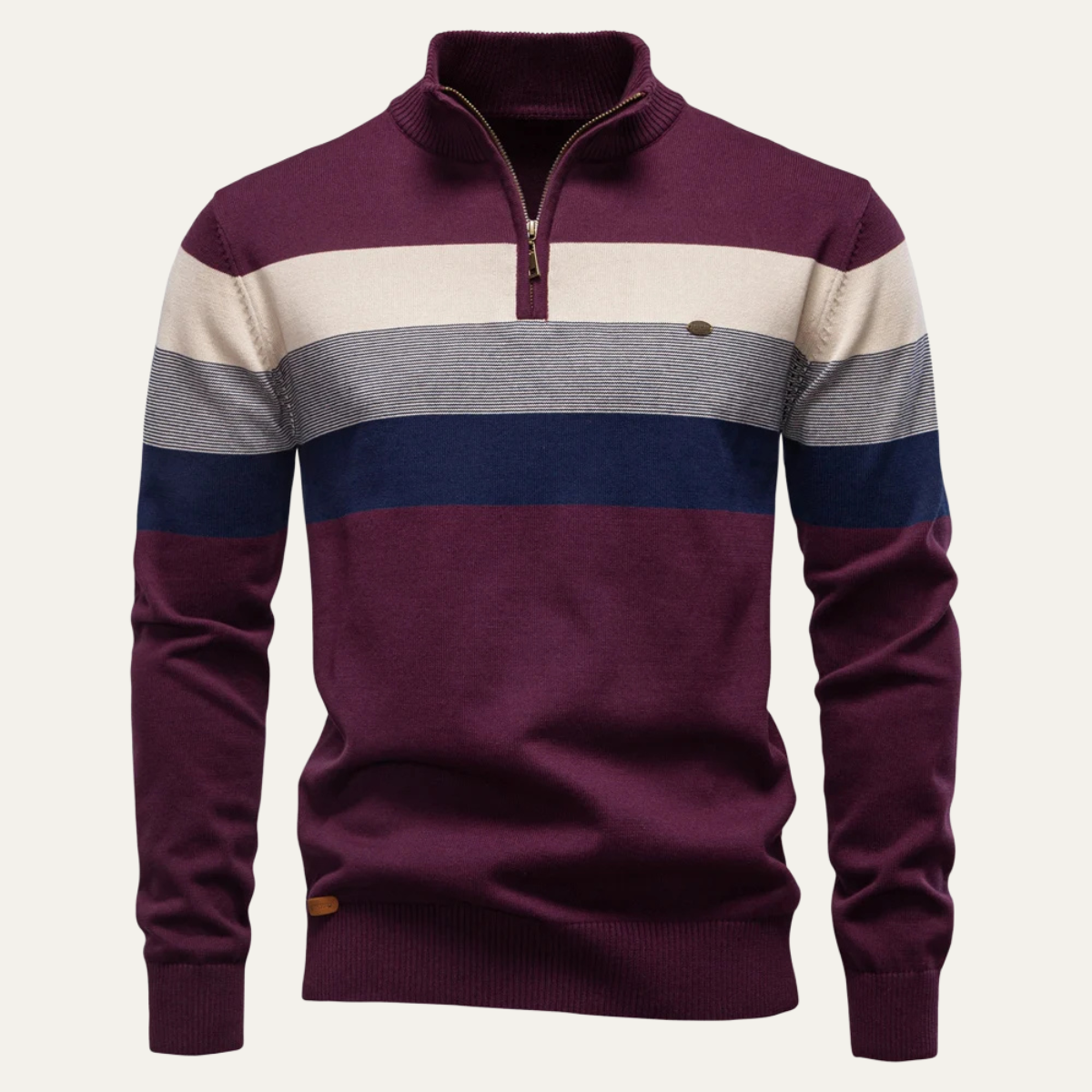 Burgundy mock-neck half-zip sweater with cream and navy stripe patchwork