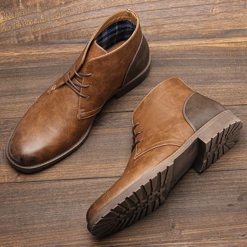 Brown lace-up ankle boots with contrast gray side panel and rugged tread sole