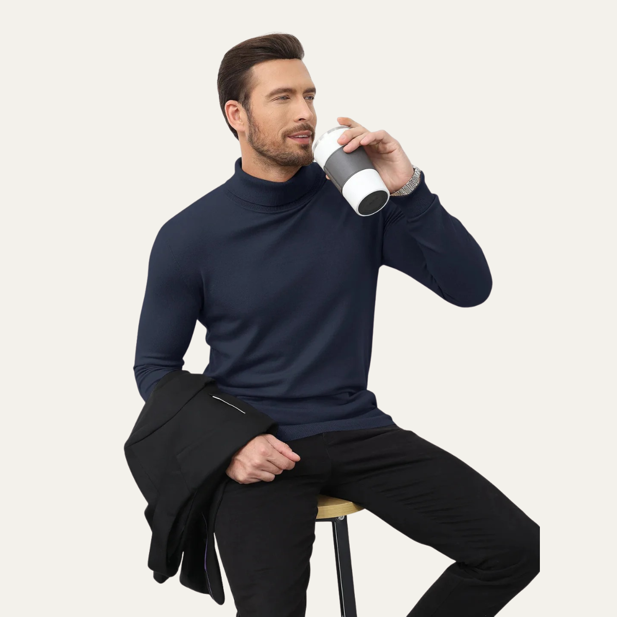 Men's navy slim-fit cotton turtleneck sweater with ribbed collar, cuffs, and hem.