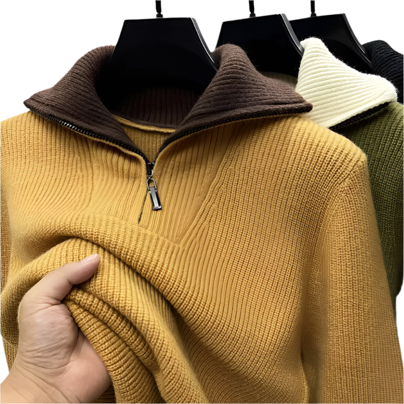 Close-up of men's quarter-zip sweater in mustard yellow knit with metal zipper