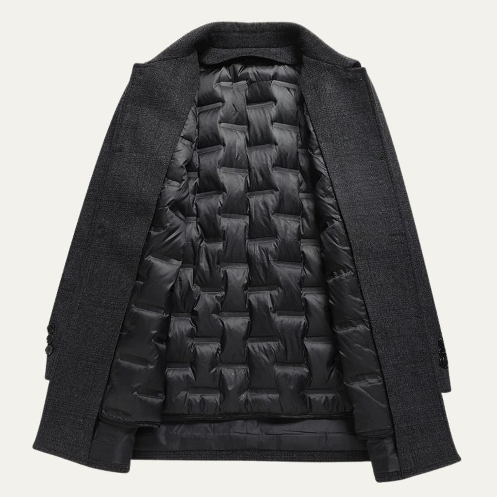 Men's wool-blend overcoat in dark gray showing quilted puffer lining and snap cuffs