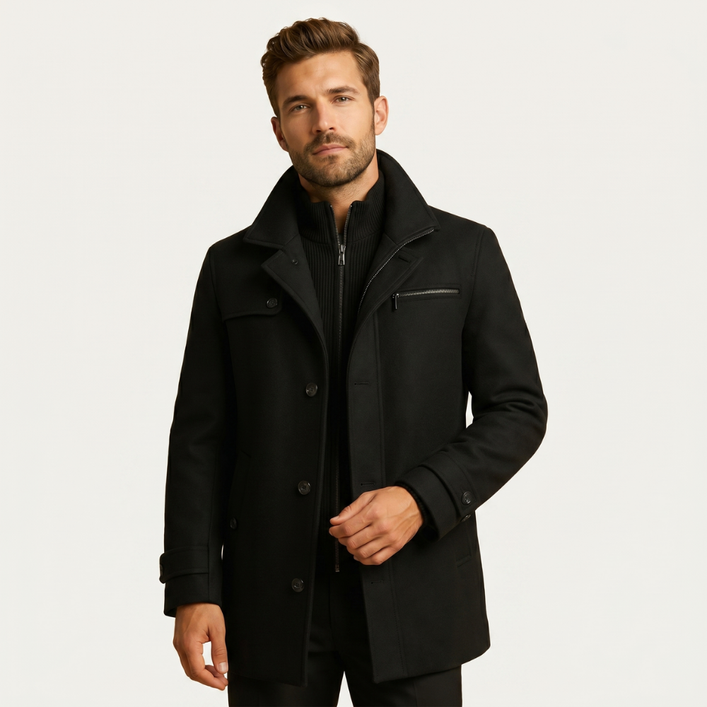 Black wool-blend overcoat on model, standing collar, front buttons, side pockets