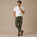 Army green slim cargo jogger pants on model, drawstring waist