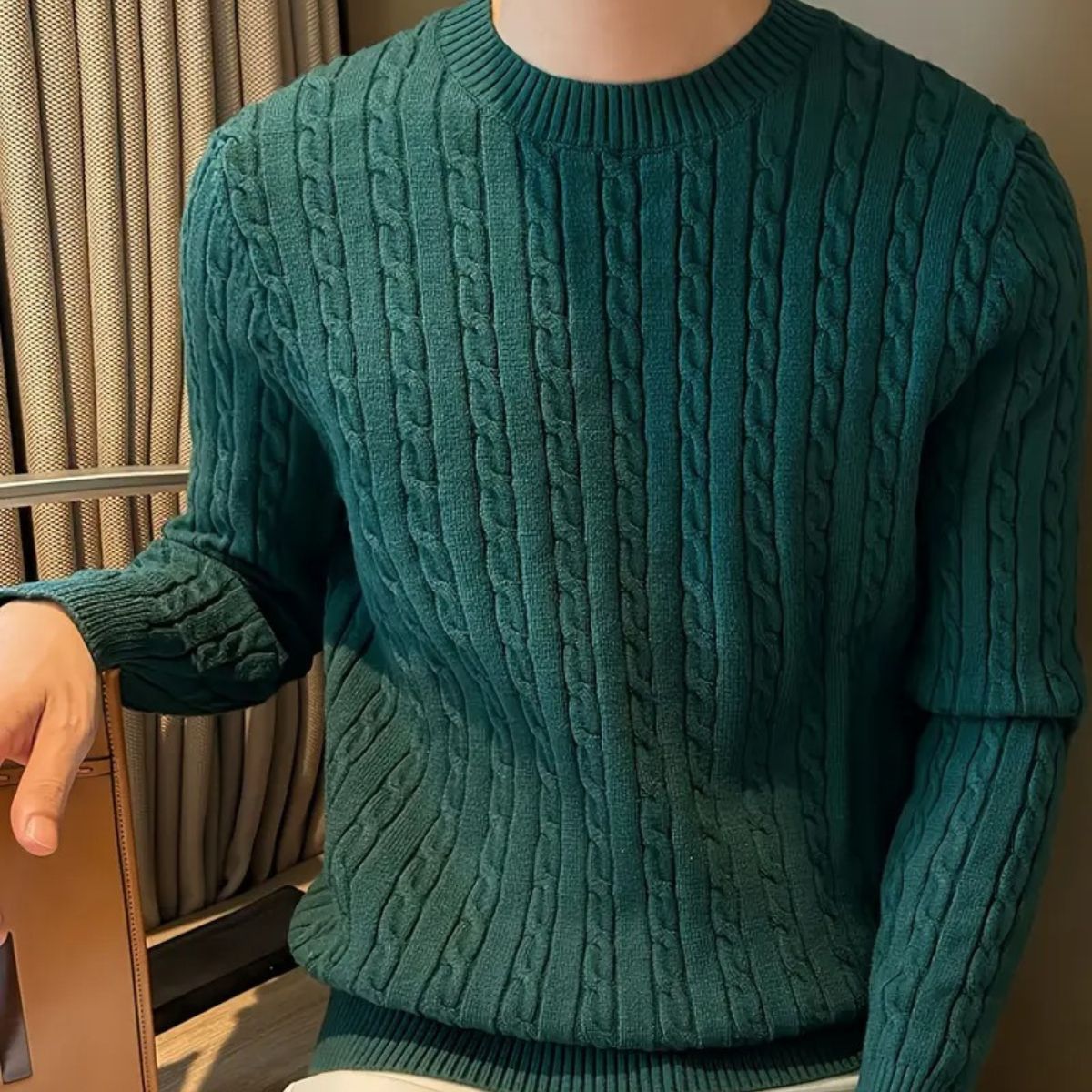 Men's green textured cable-knit sweater with crewneck and ribbed cuffs