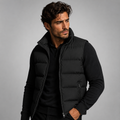 Men’s black padded puffer vest with full-zip front and zip chest pocket