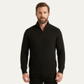 Men’s black merino wool half-zip sweater on model, rib-knit texture and long sleeves