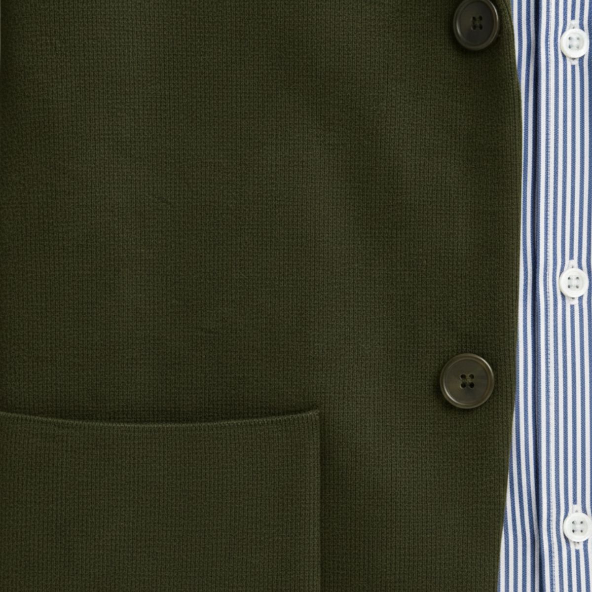 Military green cotton blazer front with four-button closure and chest welt pocket