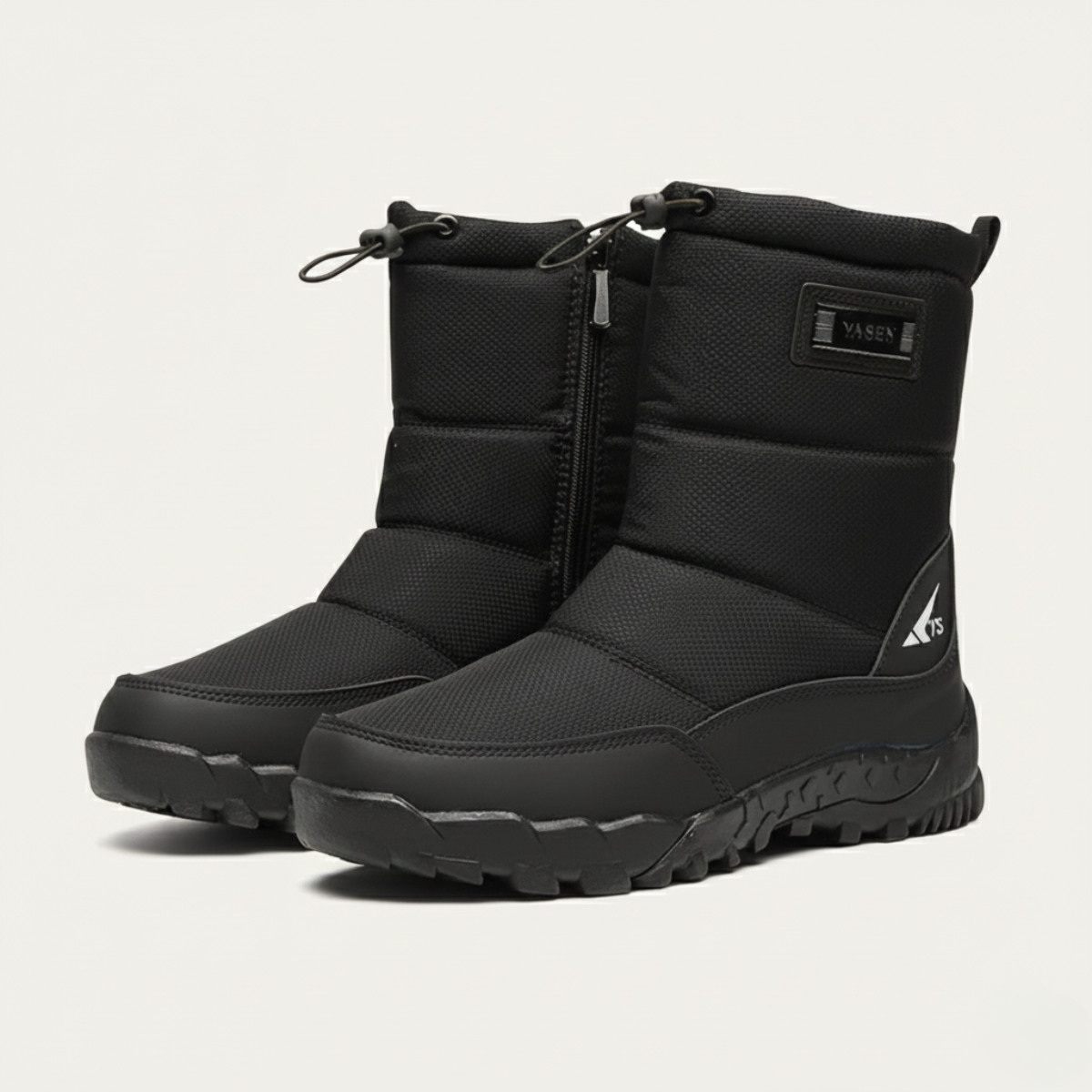 Pair of men's insulated snow boots in black, lace-up tops, side zipper, chunky tread