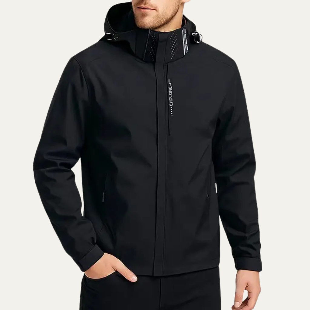 Black hooded waterproof rain jacket worn with front zipper and side hand pockets