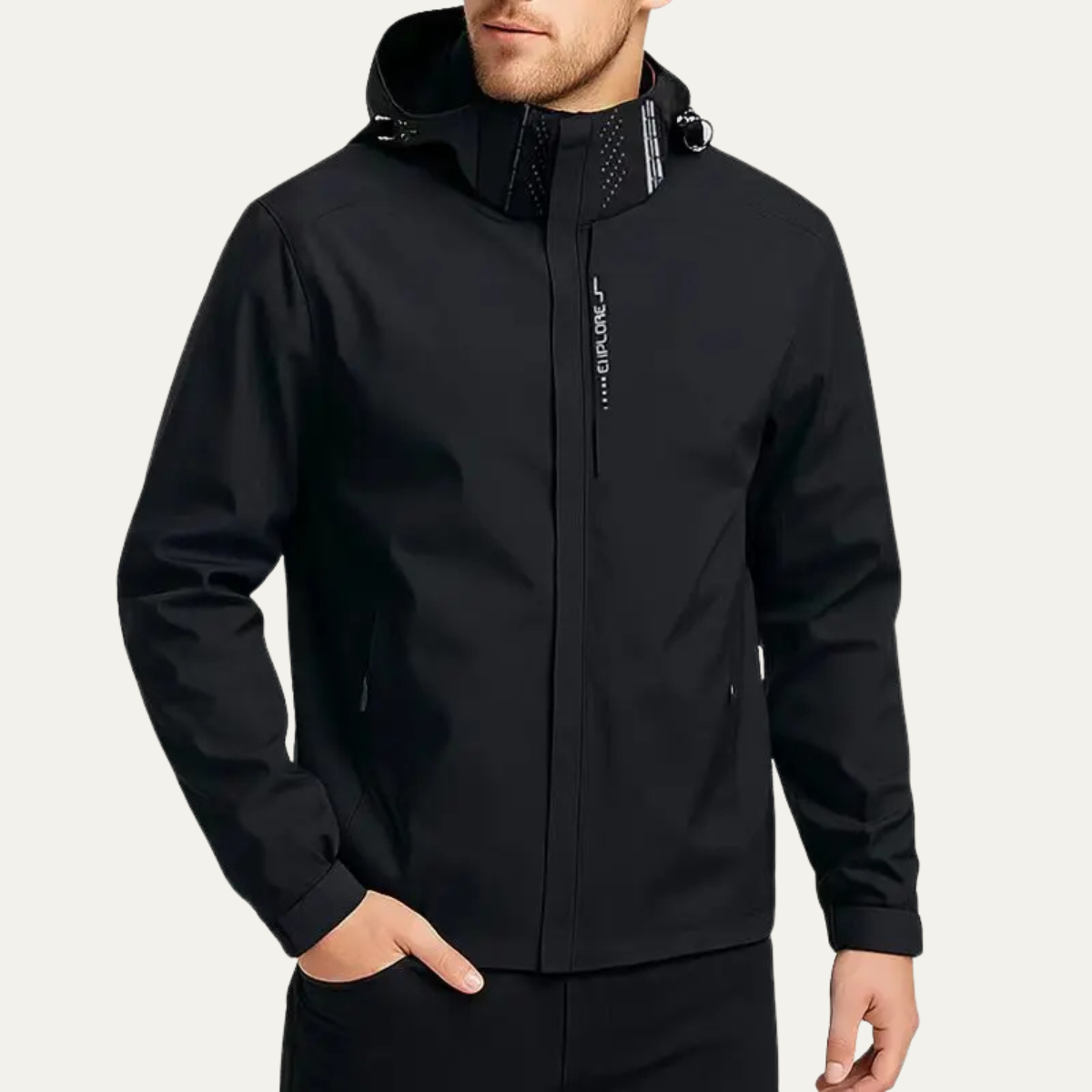 Black hooded waterproof rain jacket worn with front zipper and side hand pockets
