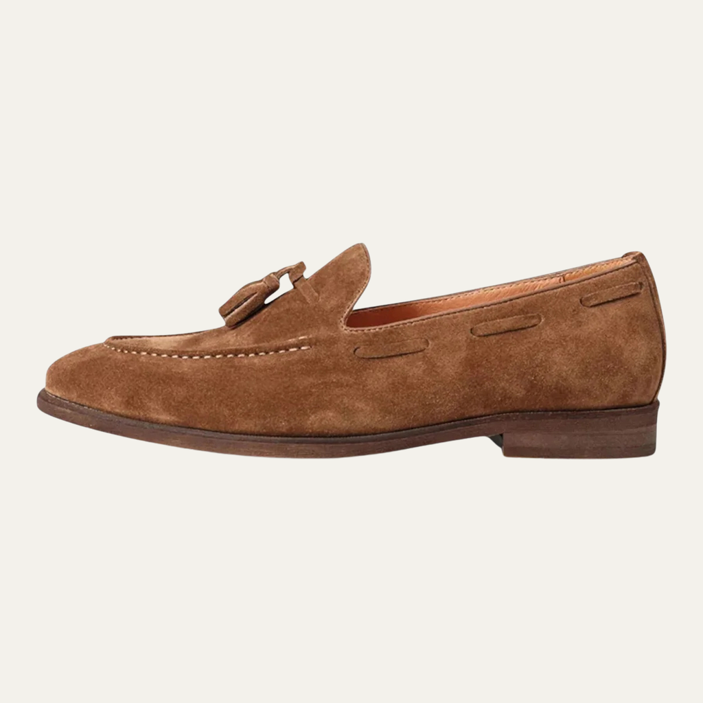 Men's faux leather tassel loafer, tan-brown slip-on with stitched moc toe detail