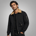 Men's black sherpa-lined bomber jacket, tan collar, sleeve zip pocket