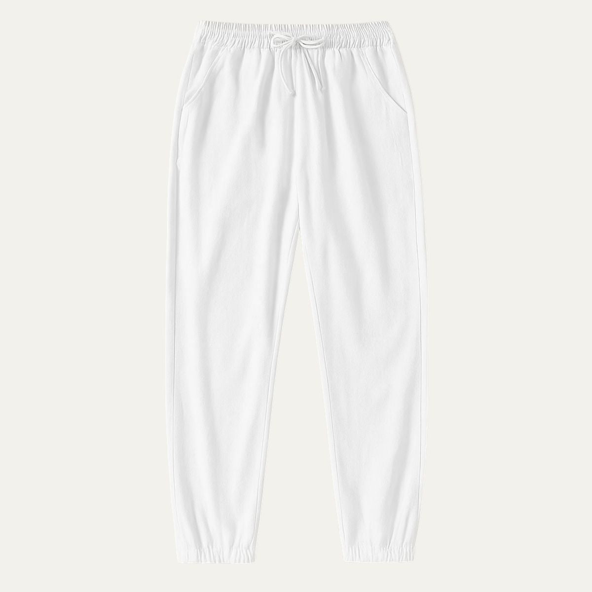 White cotton jogger pants with elastic waist, drawstring, and cuffed hems