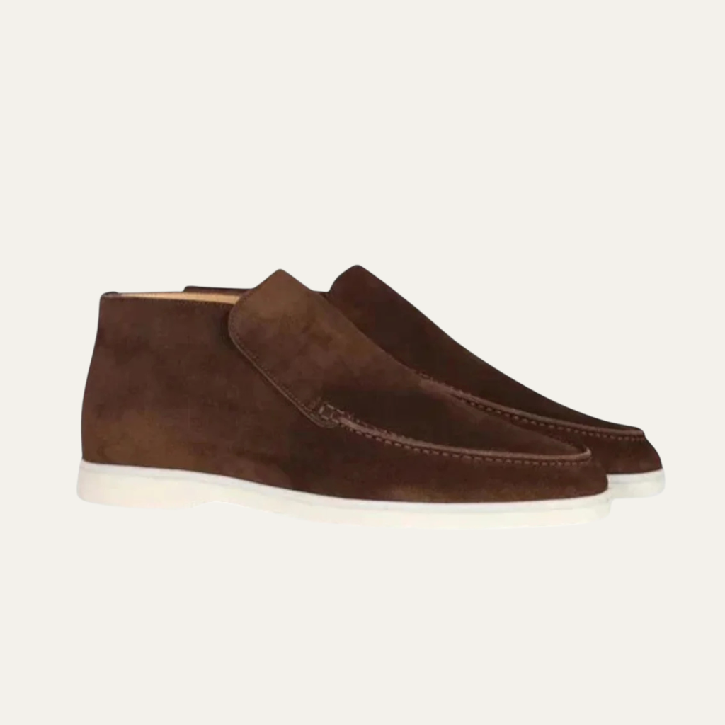 Brown suede slip-on loafers with moc stitching and low white rubber sole