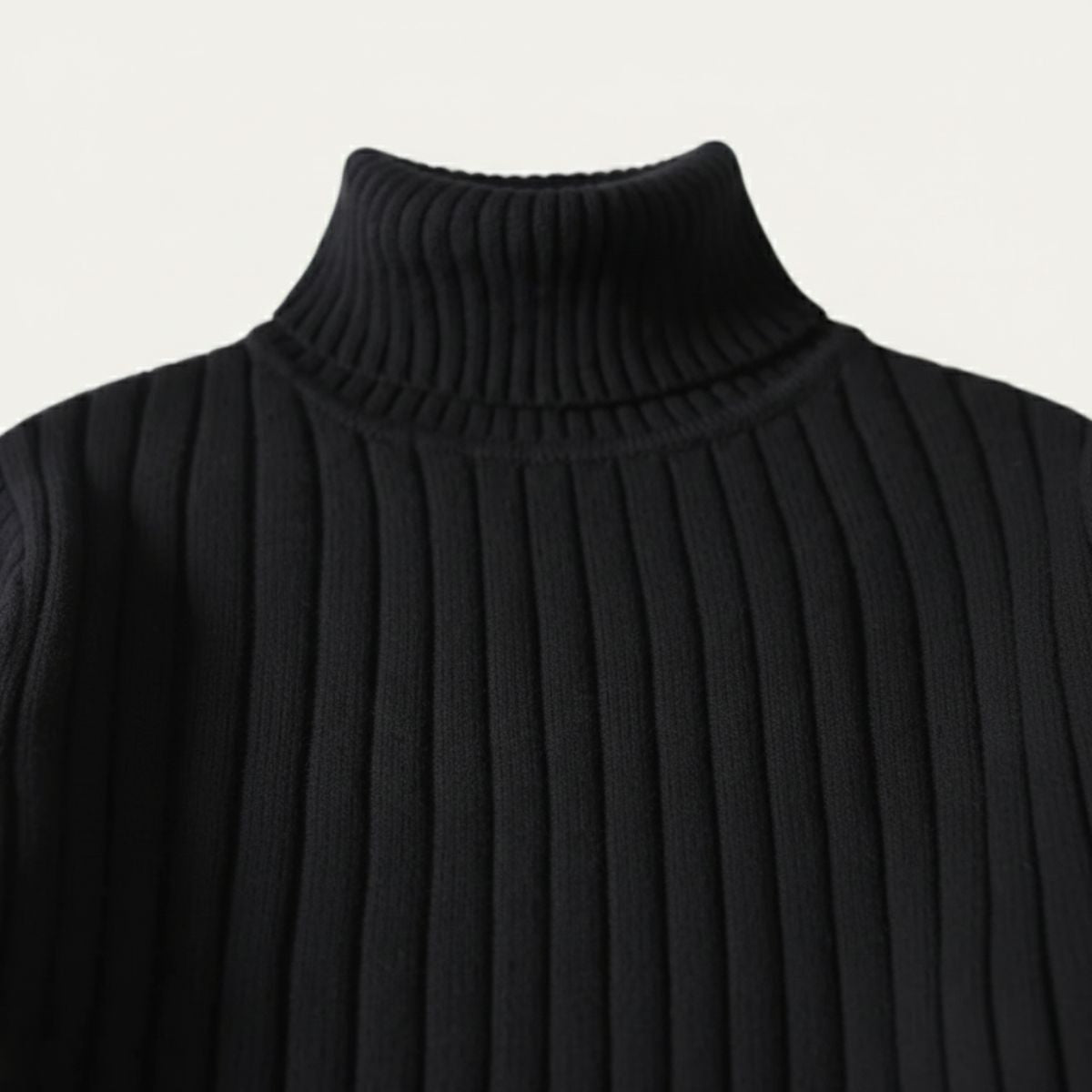 Black ribbed knit turtleneck collar with vertical texture lines