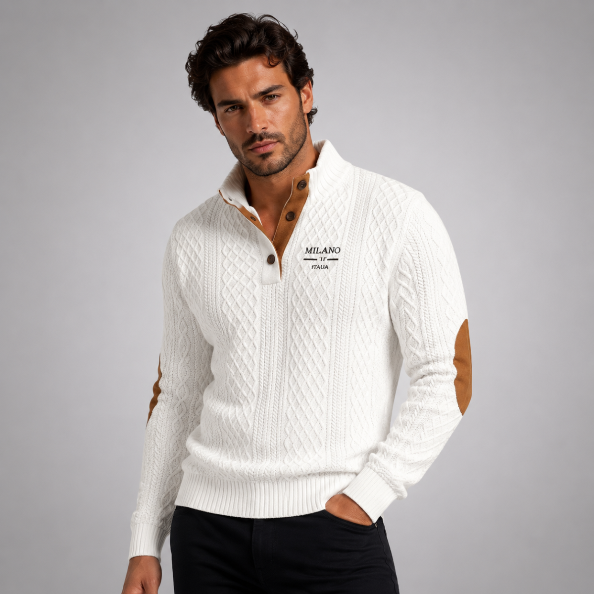 Men's quarter-zip knit sweater in light neutral, tan elbow patches, worn with dark pants