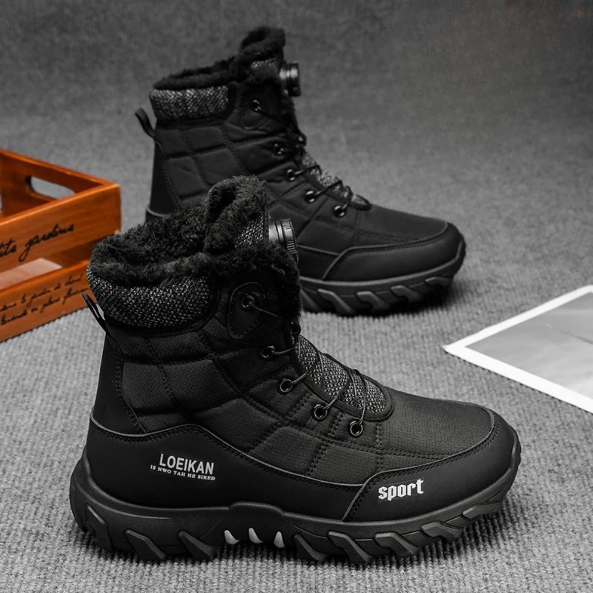 Men's black snow boots with plush lining and sport-style tread outsole