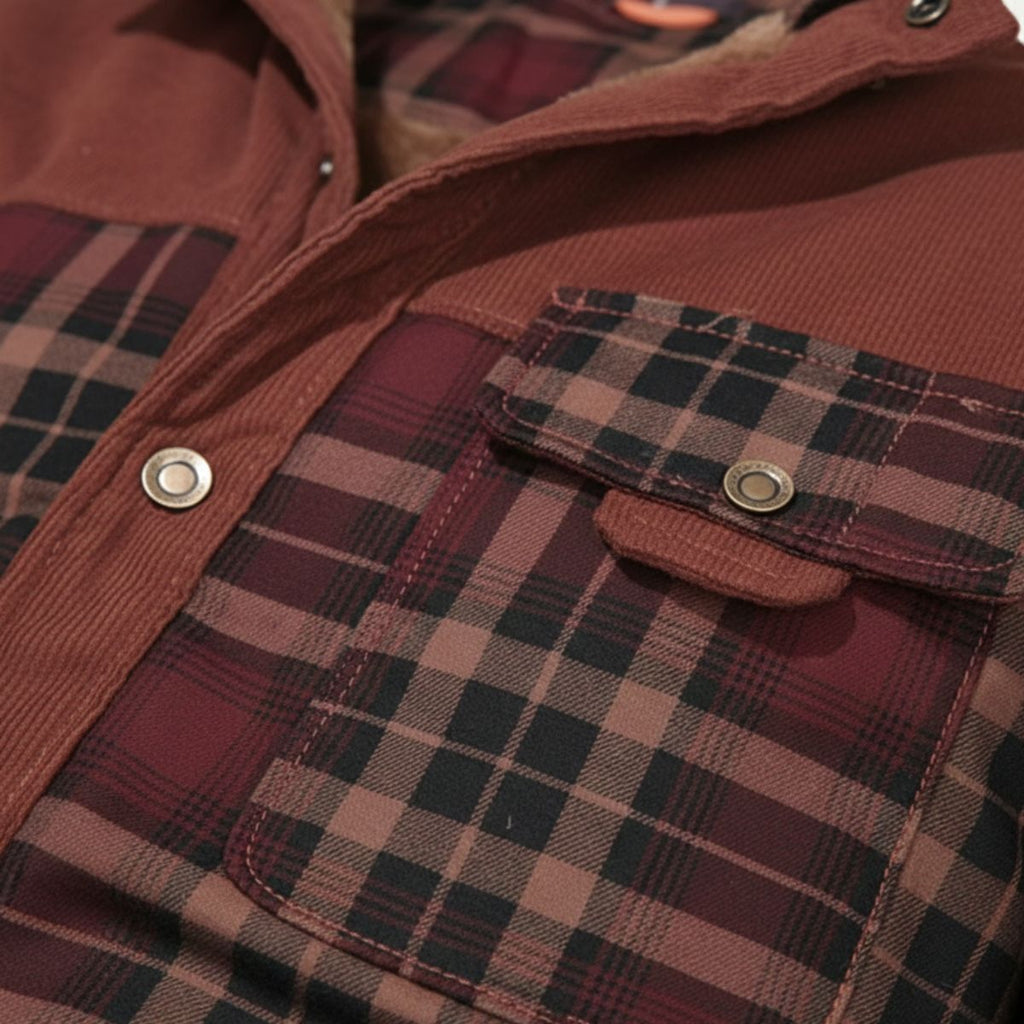 Close-up of men's plaid check jacket with snap button chest pocket