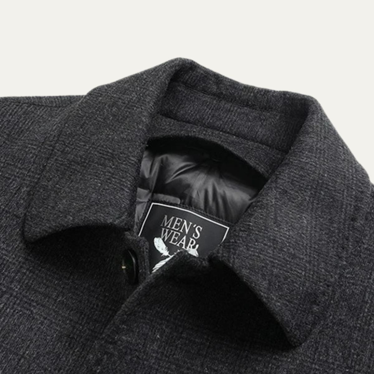 Men's wool-blend overcoat collar with brand patch on black inner lining