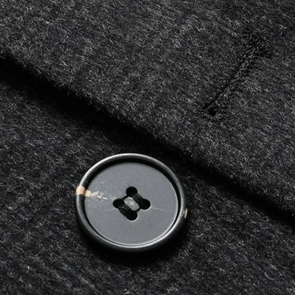 Dark gray wool-blend fabric with round black button detail