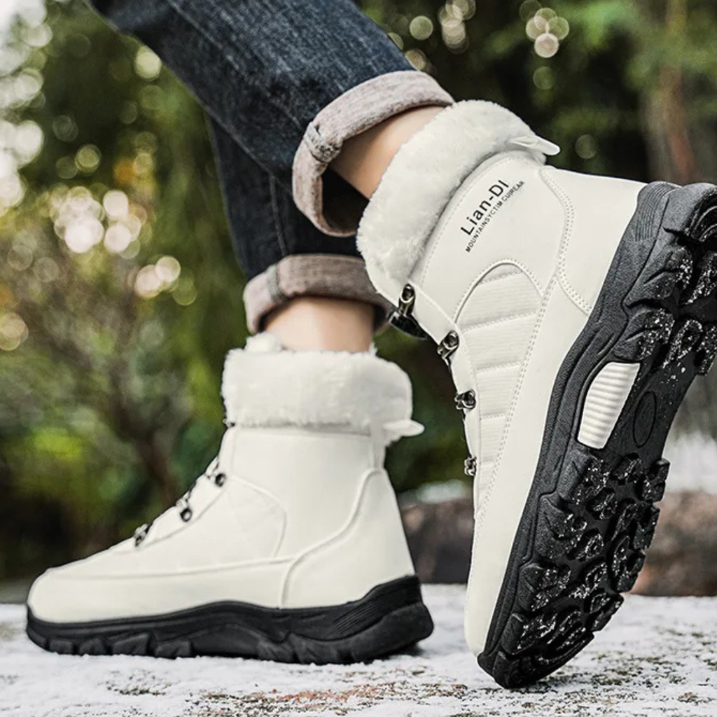 Men's white winter snow boots, faux fur collar, lace-up front, and textured traction sole