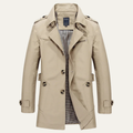Men's tan double-breasted trench coat with flap pockets and buttoned cuffs