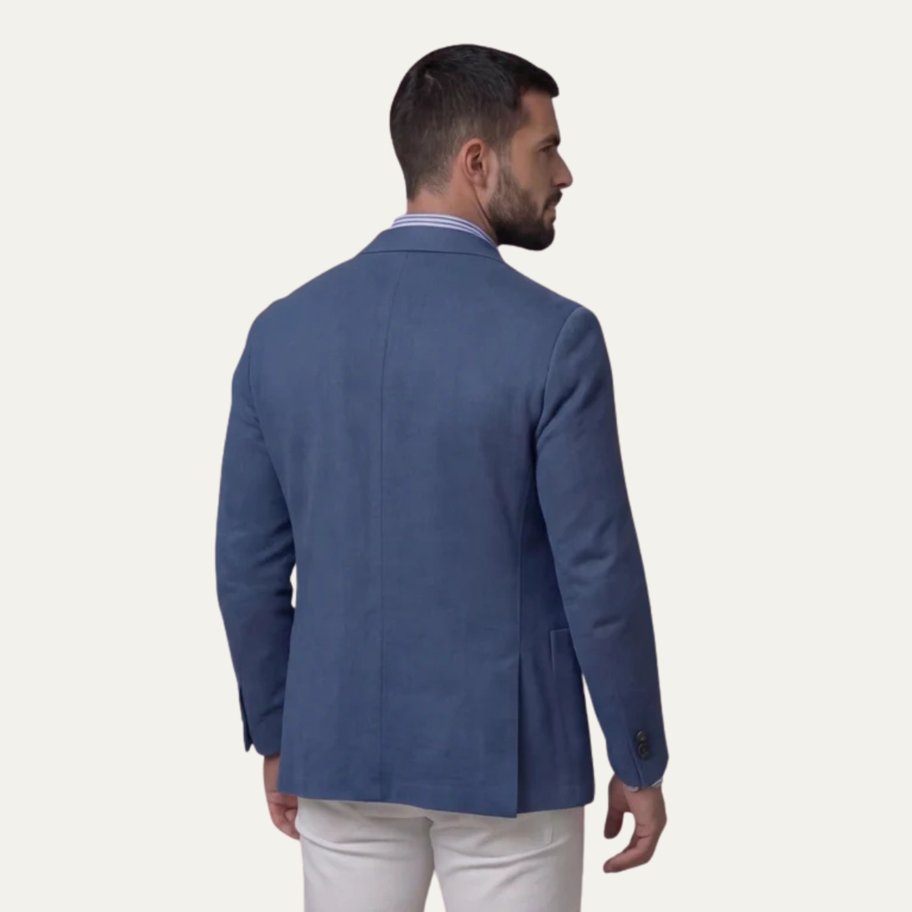 Men's lightweight slim-fit blazer in blue, back view with single vent.