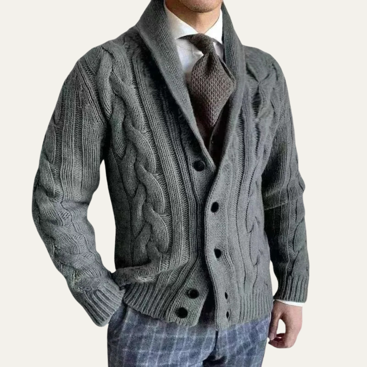 Dark gray cable knit shawl-collar cardigan with button front and long sleeves