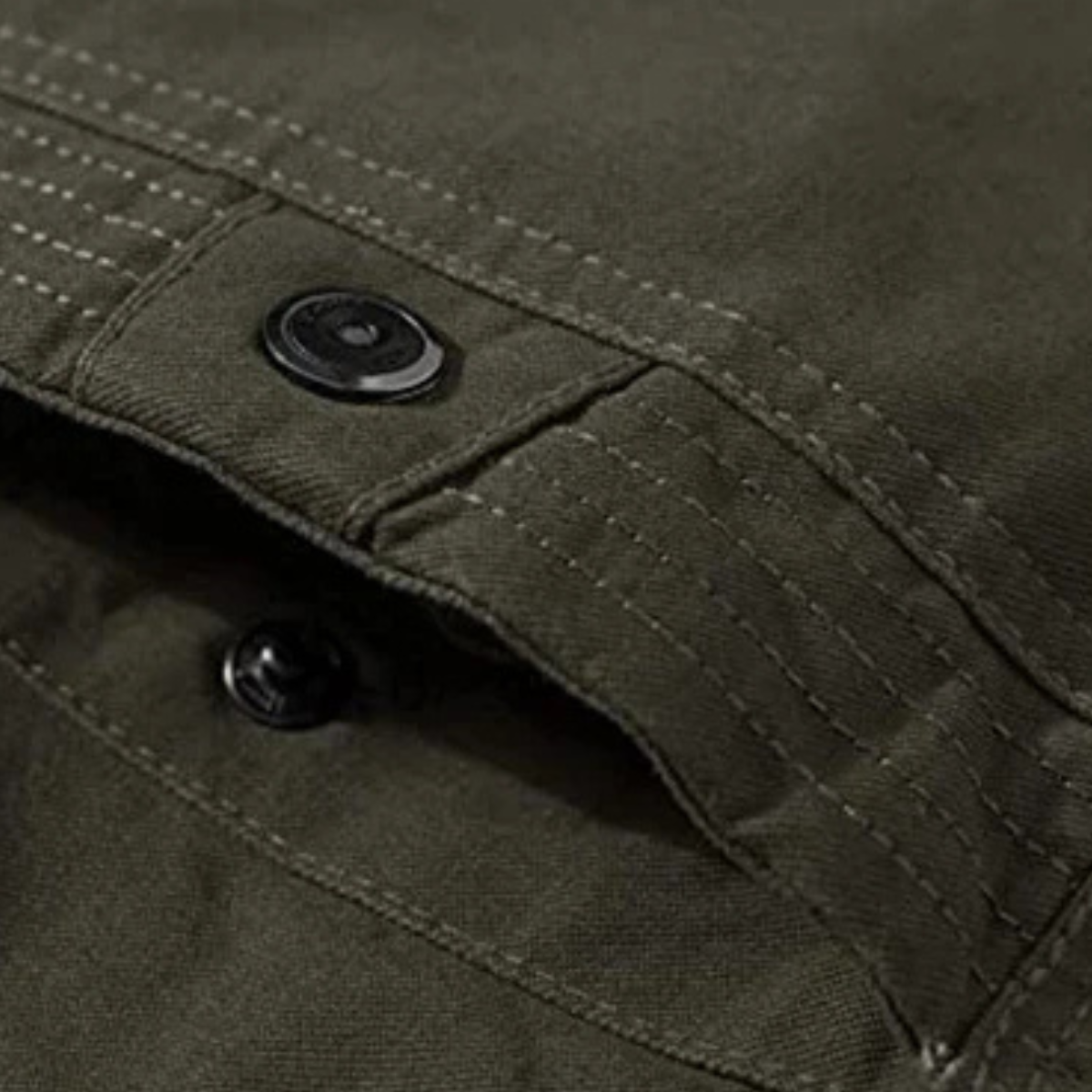 Dark green military zip jacket close-up with flap pockets and snap buttons