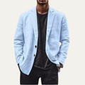 Men's light blue linen blazer with notch lapels and chest pocket, two-button front