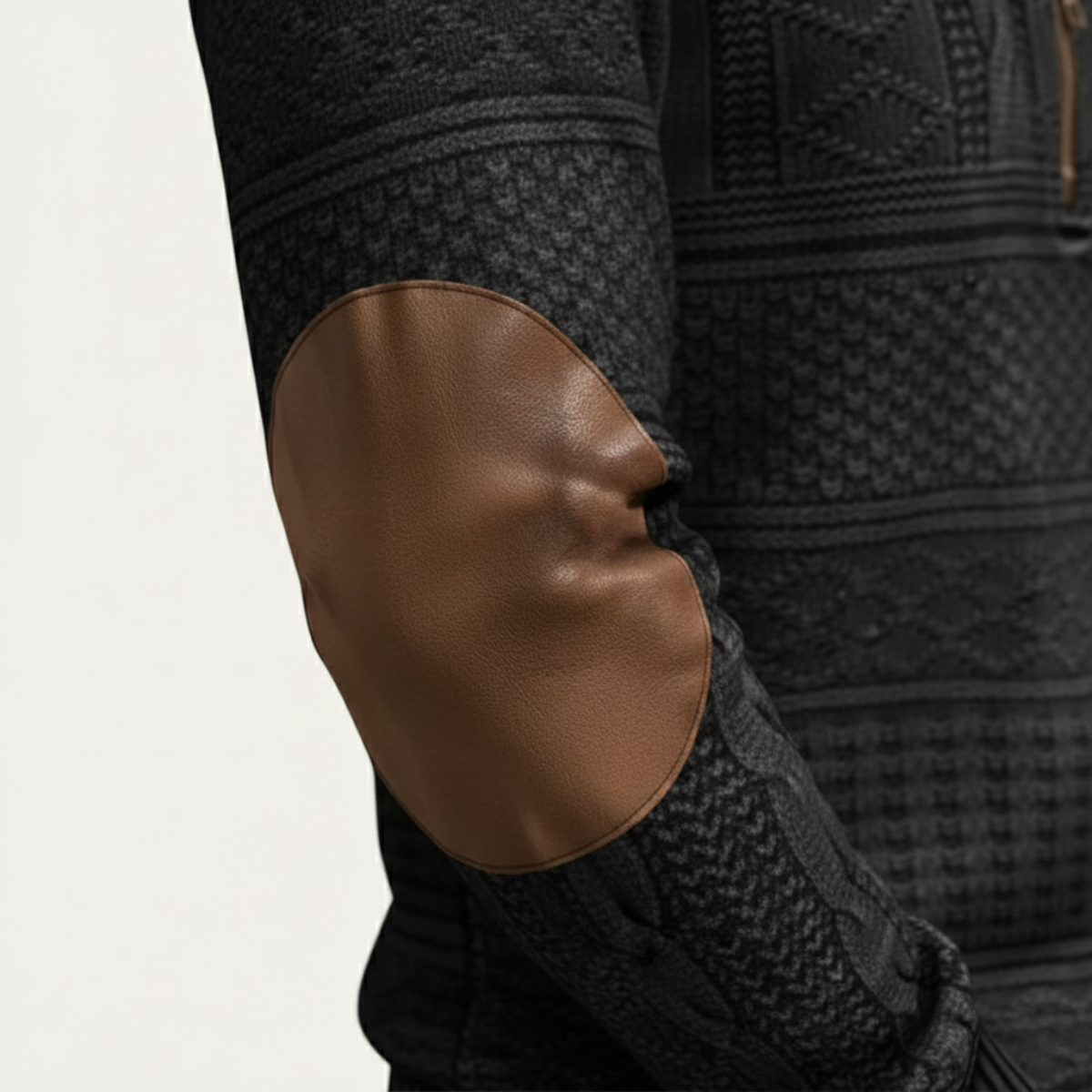 Men's patterned half-zip sweater with brown leather elbow patch
