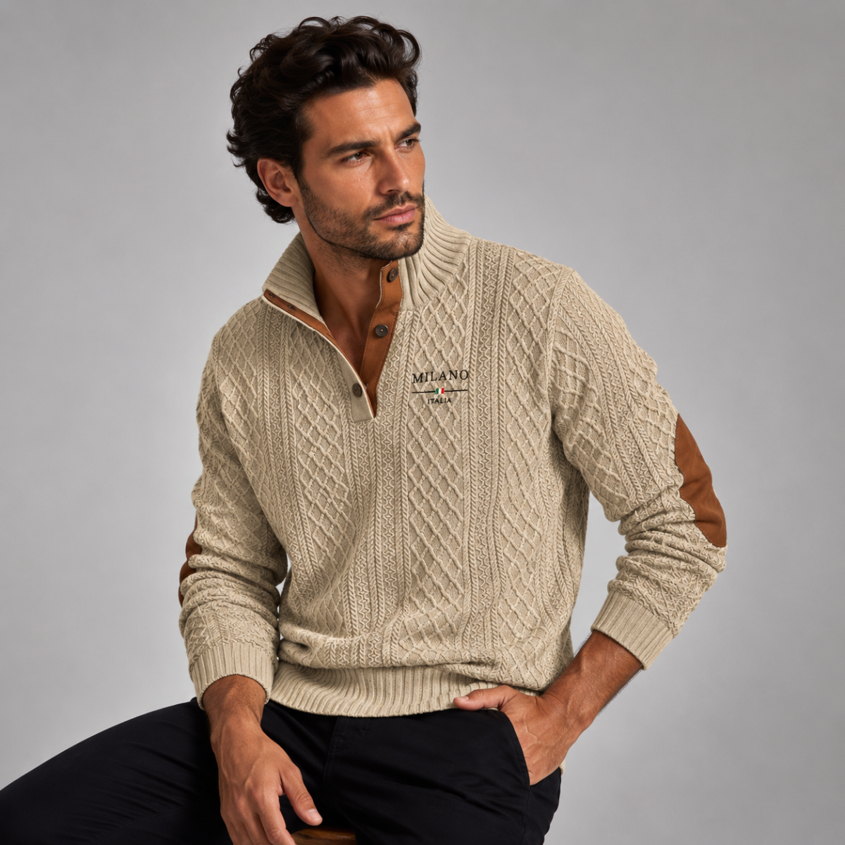 Men's quarter-zip knit sweater in beige with tan elbow patches, worn with dark pants