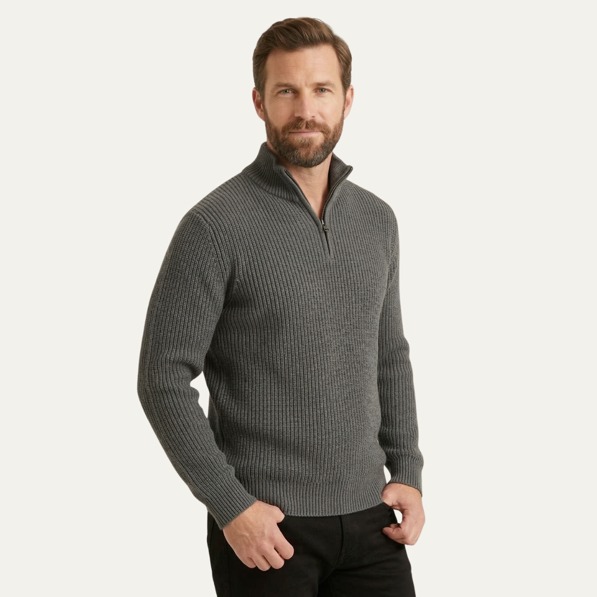 Men’s gray merino wool half-zip sweater on model, quarter-zip placket and ribbed hem