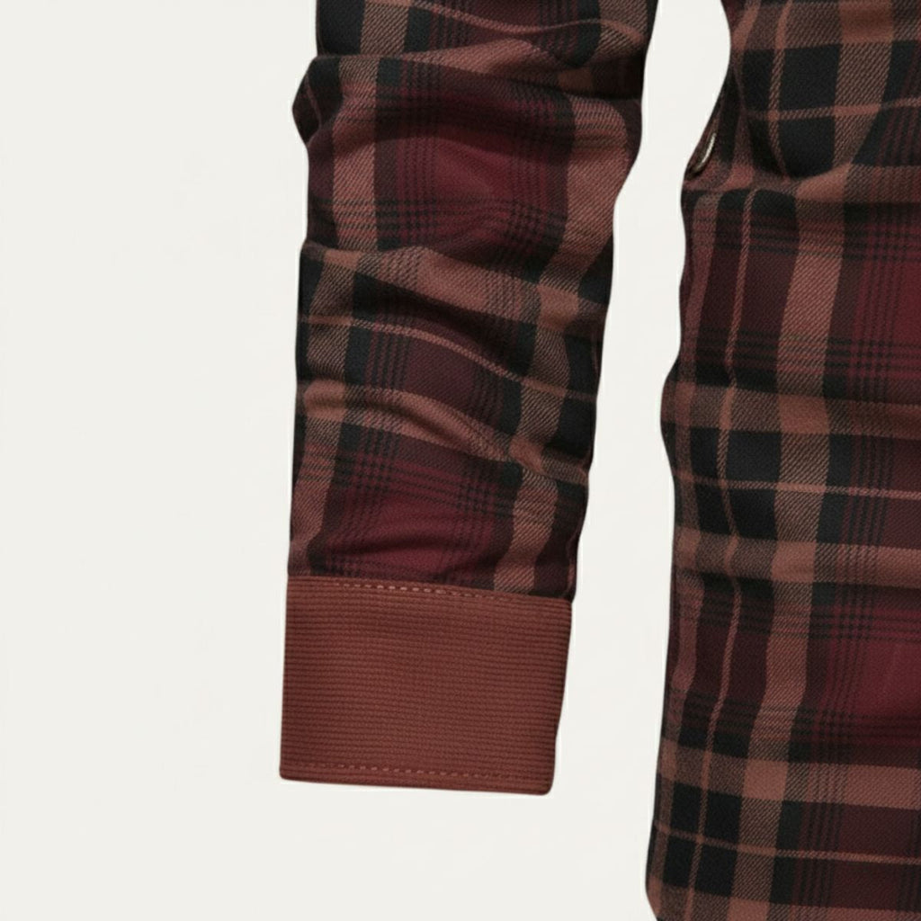 Men's plaid check jacket sleeve with corduroy cuff and button detail