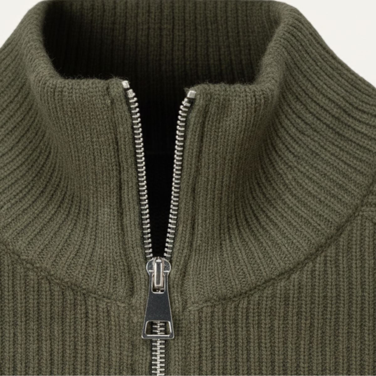 Olive green zip-up knit cardigan with high collar and silver zipper