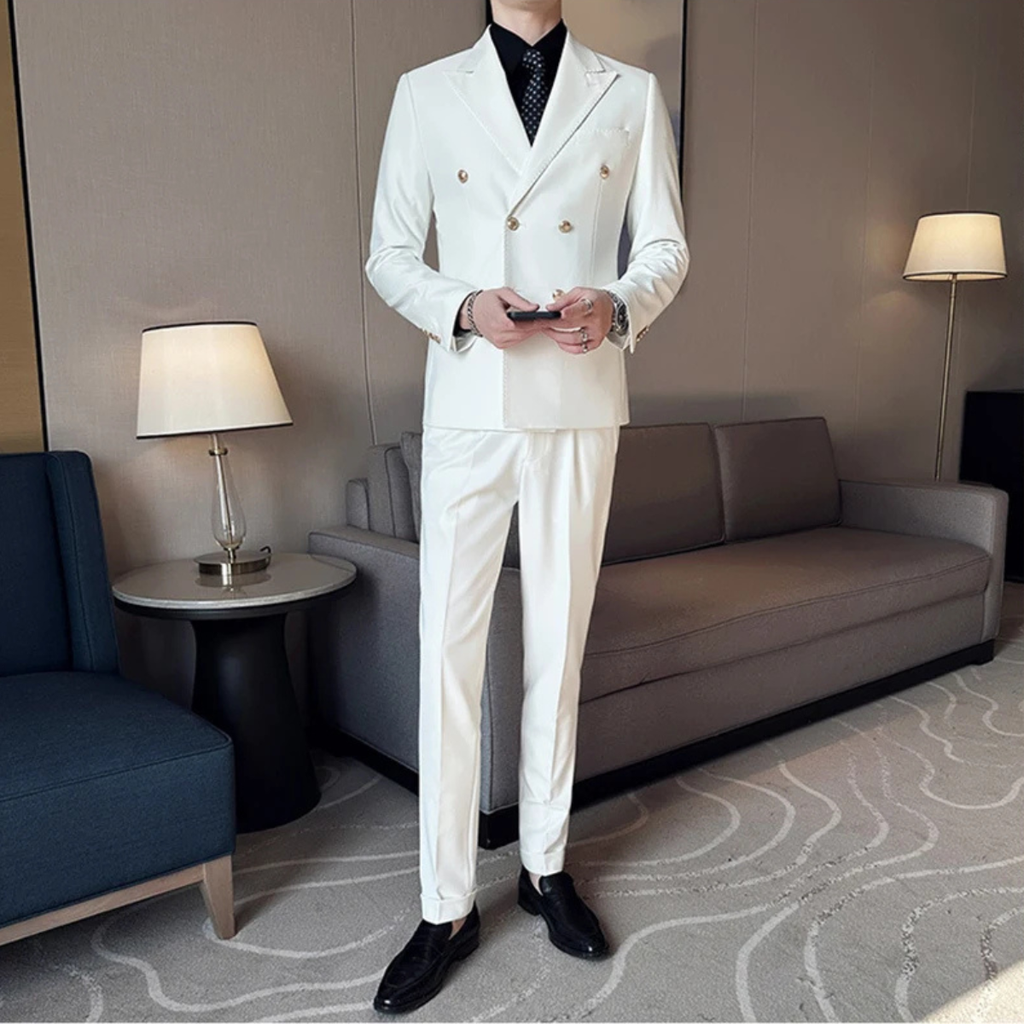 Men’s white double-breasted suit with matching trousers, model wearing jacket and pants